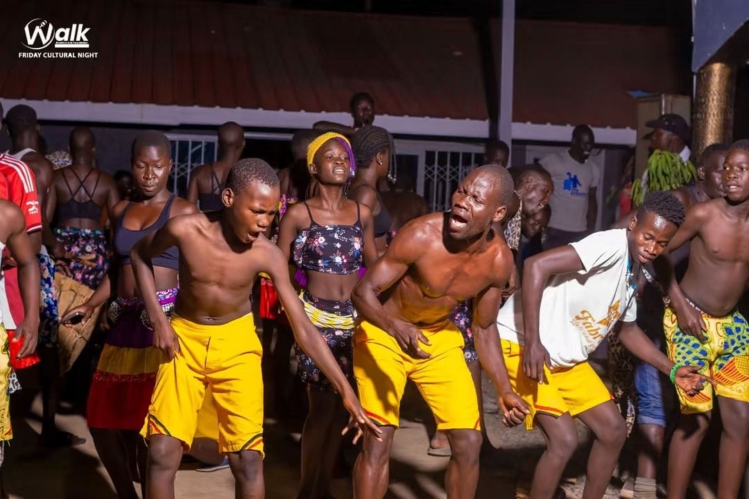 Men dancing at WALK event